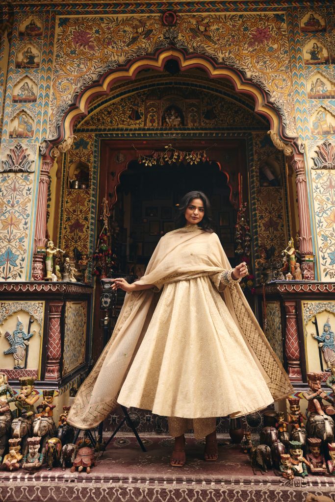 Zeenat White Golden Anarkali Set