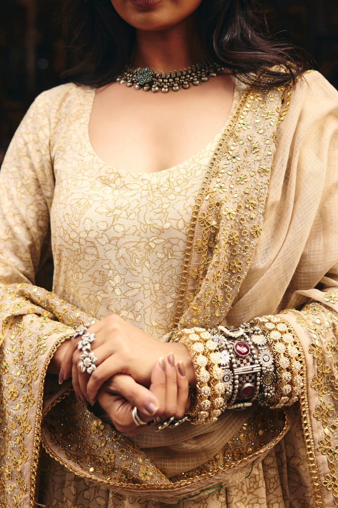 Zeenat White Golden Anarkali Set